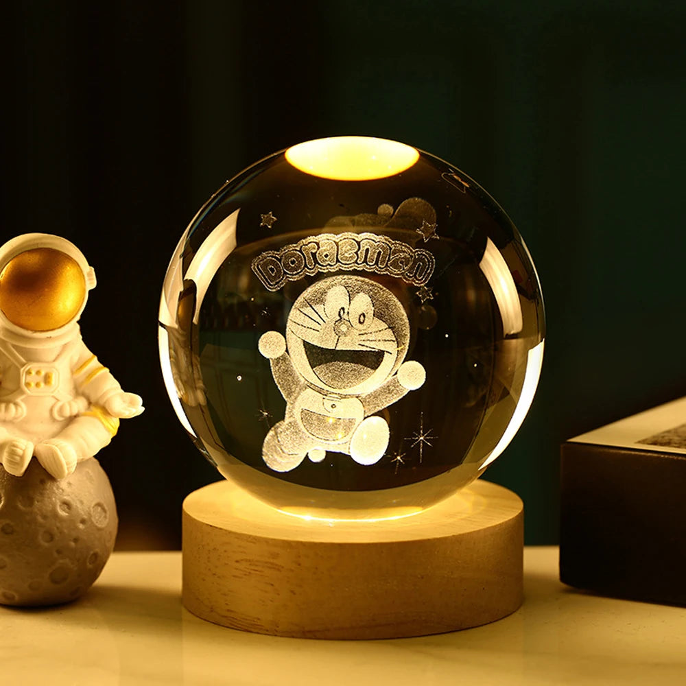 Esfera de cristal 3D grabada con el diseño Gato Cósmico, sobre base de madera con luz LED – LuxeOrb3D