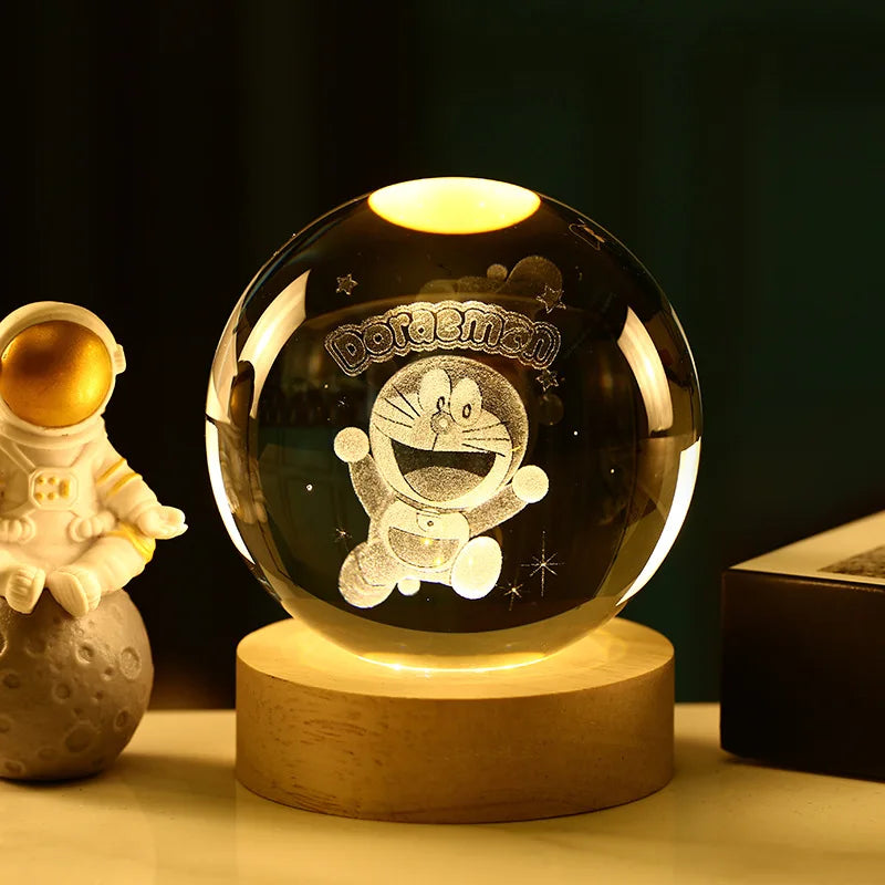Esfera de cristal 3D grabada con diseño de Gato Cósmico, sobre base de madera con luz LED – LuxeOrb3D